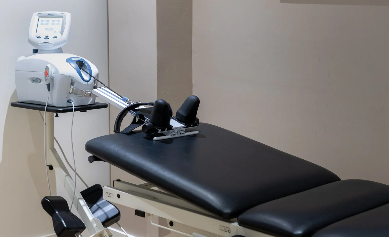 Patient on a spinal decompression table